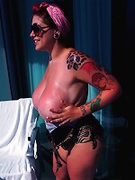Amateur big tit babe Dors Feline rubs lotion into her huge tits